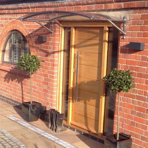 Stunning Property With One Of Our Arched Door Canopies Made To Fit The Impressive Entrance Door