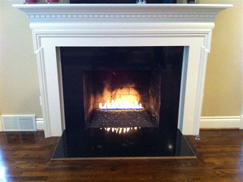 Maybe you would like to learn more about one of these? Gas Fireplace Glass Pebbles | They both can be operated by ...