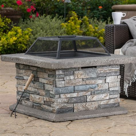 Canada's online platform for outdoor fire pits! Coonrod Faux Stone Wood Burning Fire Pit Table & Reviews ...