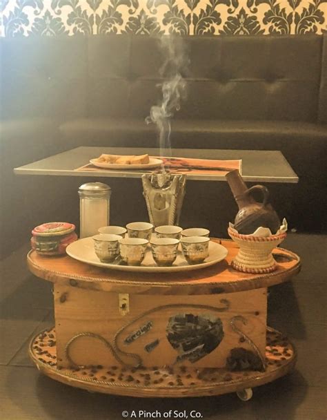 There is a routine of serving coffee daily, mainly for the purpose of getting together with relatives, neighbors, or other visitors. Ethiopian Coffee Ceremony Table - Rascalartsnyc
