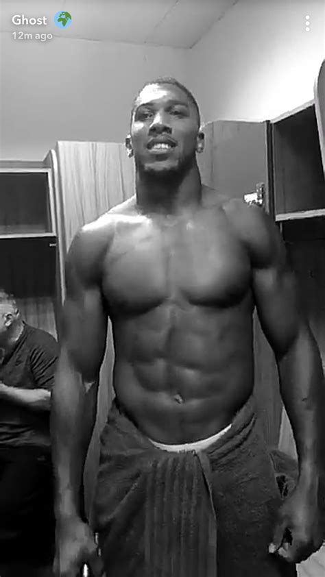 Nigerian British Boxer Anthony Joshua Shows Off His Rock Hard Abs While Wearing Just A Towel