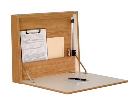 Build the wall frame from the 1x2s and the sheet of pegboard as shown. Wall Mounted Folding Desk - Oak Finish