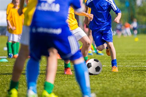 Teenagers Boys Playing Soccer Football Match Young Football Players