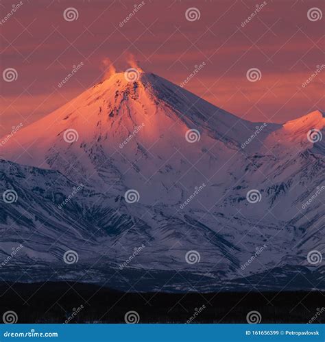 Winter Volcanic Landscape Of Kamchatka Peninsula At Purple Violet