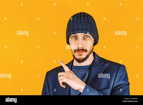 Portrait Of Handsome Man Pointing Finger At Background Stock Photo Alamy