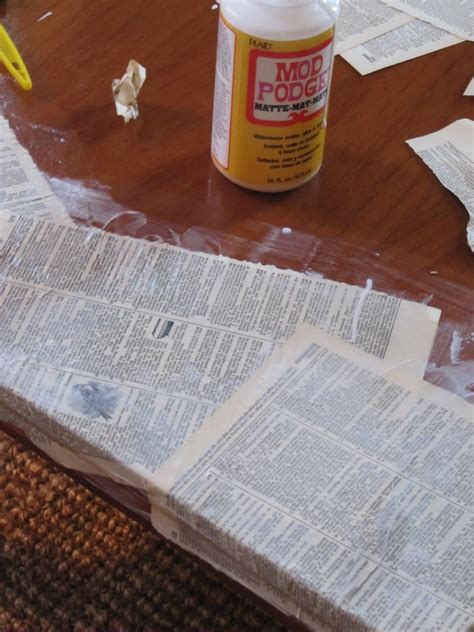 It was driving me nuts so i decided to decoupage the top to add color, texture, and dimension to an otherwise boring table. Sew Many Ways...: Coffee Table Makeover...Mod Podge Style