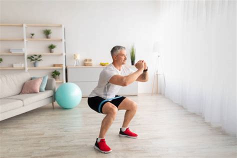 1500 Senior Squat Exercise Stock Photos Pictures And Royalty Free