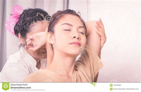 Thai Massage Therapist Is Massaging A Woman Arm In Spa Stock Image