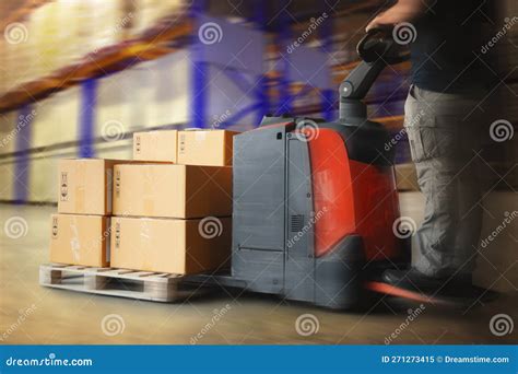 Fast Motion Of Workers Unloading Package Boxes On Pallets In Storage Warehouse Electric
