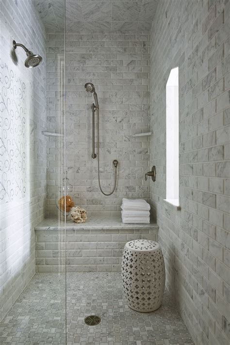 White subway tile with white grout on one shower wall keeps things classic and contrasts nicely. 40+ Creative Ideas for Bathroom Accent Walls - Designer Mag