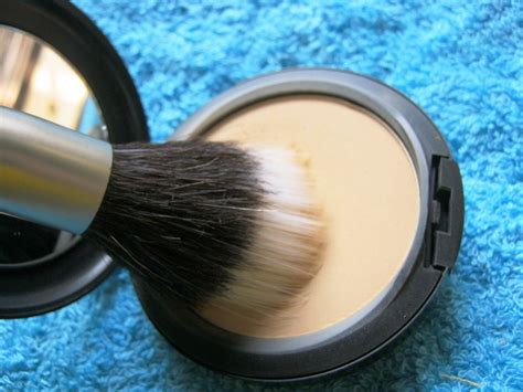Use a rounded foundation brush to apply powder foundation since you are applying it over a layer of cream foundation. MAC Studio Fix Powder Plus Foundation NC40 : Review & Swatch