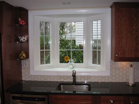 A garden window provides a great space for plants and flowers, or … you name it. kitchen sink bay window | Home Ideas | Pinterest | Kitchen ...