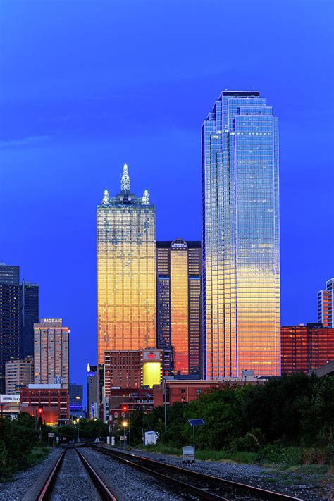 Dallas Texas Skyline During The Blue Hour With The Sunset Reflecting