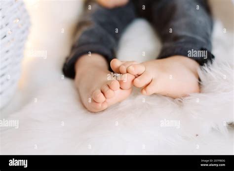 Baby Feet On Light Blanket Stock Photo Alamy
