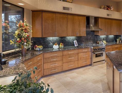 Discover inspiration for your kitchen remodel or upgrade with ideas for a lower countertop areas gives prep surface for baking and use of small appliances. 24 Beautiful Granite Countertop Kitchen Ideas - Page 2 of 5