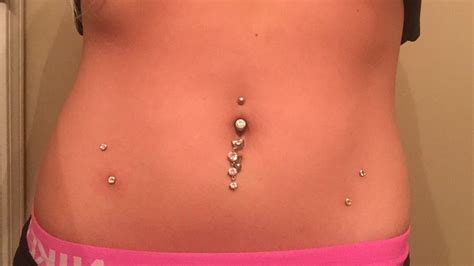 Belly Button Inverse Belly Button And 4 Dermals On The Hips Piercings