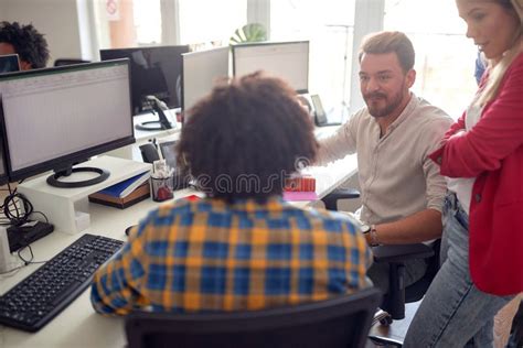 Group Of Young Creative Coworkers Working Together Stock Image Image