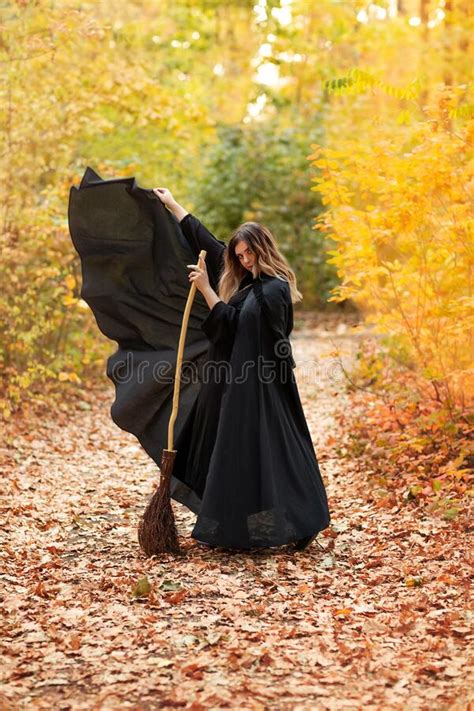 Young Witch Walking In Autumn Forest Stock Photo Image Of Body