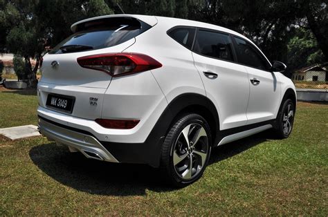 Applicants should submit the following documents together with a duly completed application form: Hyundai Tucson 2.0L R-Series CRDi Turbo Diesel Rear View ...
