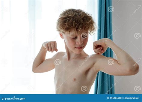 Young Teenager Boy Showing Arms Muscles Proud Fitness Concept Stock