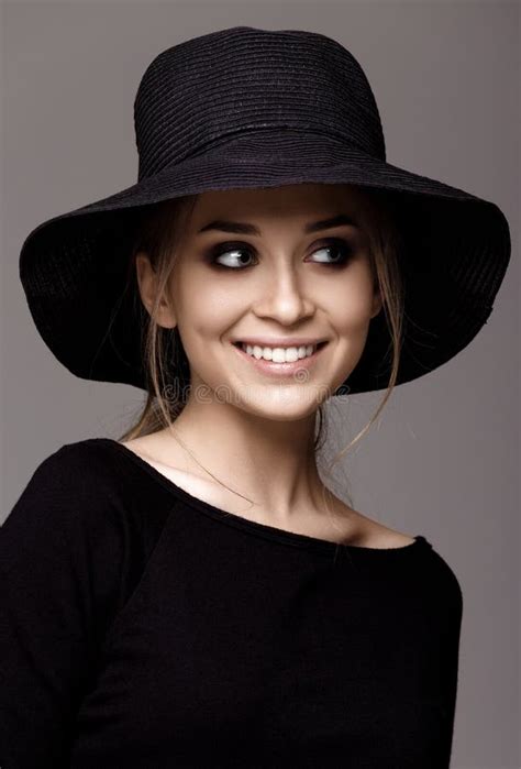 Portrait Of A Beautiful Woman In Black Hat Portrait Isolated Stock