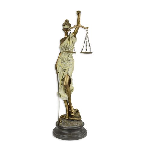 A Resin Figurine Of Lady Justice