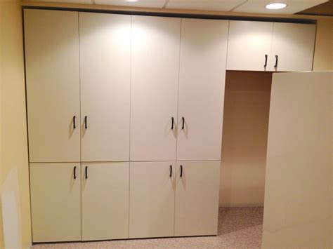 I understand the difference is mainly in 100% solid wood construction on custom vs solid wood only on fronts and to answer your question, it all depends on the purpose. Custom Made Painted Storage Cabinets by The Plane Edge ...
