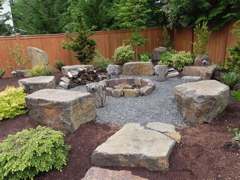 Cool Gravel Area And Large Rock Seating Fire Pit Landscaping Fire