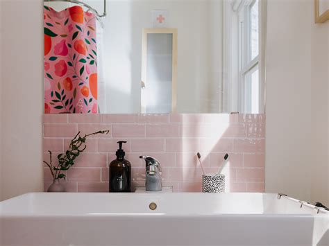 I like the combination of warm paint, dark wood and white marble. Small Bathroom Ideas: Genius Updates On A Budget | Chatelaine