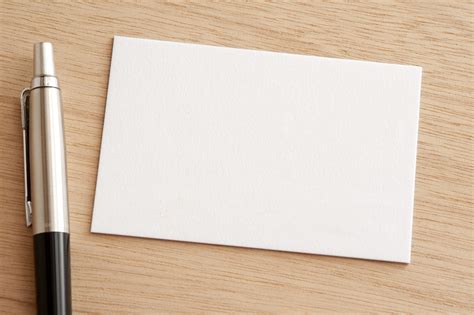 Free Stock Photo 12721 Blank White Business Card With Pen Freeimageslive