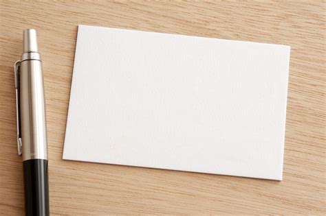 Do you like this video? Free Stock Photo 12721 Blank white business card with pen ...