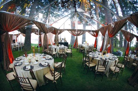 While your wedding ceremony and reception will take place at defined locations, help set the romantic mood by decorating how guests will reach those places. RainingBlossoms: Wedding Receptions Tents Decoration