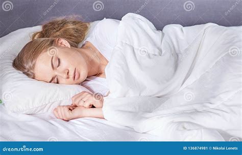 Beautiful Girl Sleeps In The Bedroom Lying On Bed Stock Image Image