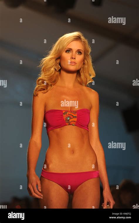 MIAMI BEACH FL JULY 16 A Model Walks The Runway For The Caffe