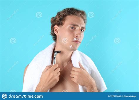 Young Man With Face Hurt While Shaving Stock Photo Image Of Beard