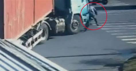 How Did He Survive Watch Incredible Moment Cyclist Sits Up After Being