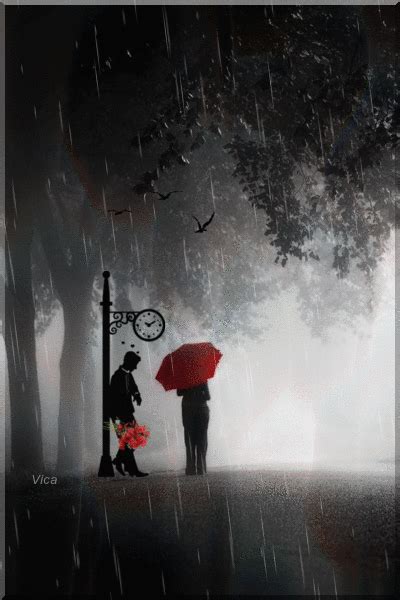Two People Standing Under An Umbrella In The Rain
