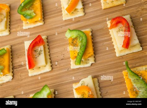 Appetizers Or Snacks On Saltine Crackers With Sliced Cheese Sweet