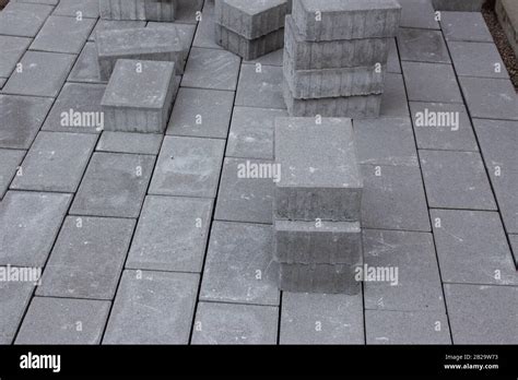 Concrete Paver Blocks Laid Beside A Building Some Paving Stones Are