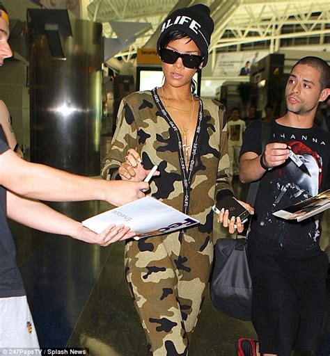 Rihanna Covers Up For Once In Her Onesie But Can T Help But Stand Out