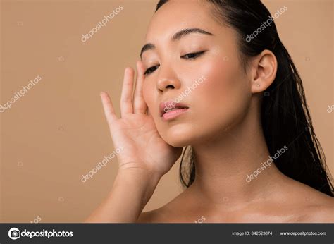 Beautiful Naked Asian Girl Touching Face Isolated Beige Stock Photo