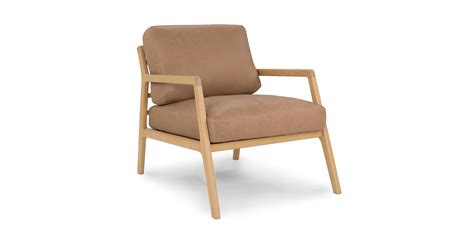 Subtle Effortless Debonair The Denman Chair Rests On A Sleekly
