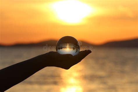 Sunset Glass Ball Reflection Of Sea Sunset Stock Image Image Of Hand