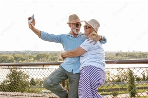 Lovely Old Couple Taking A Selfie Photo Free Download