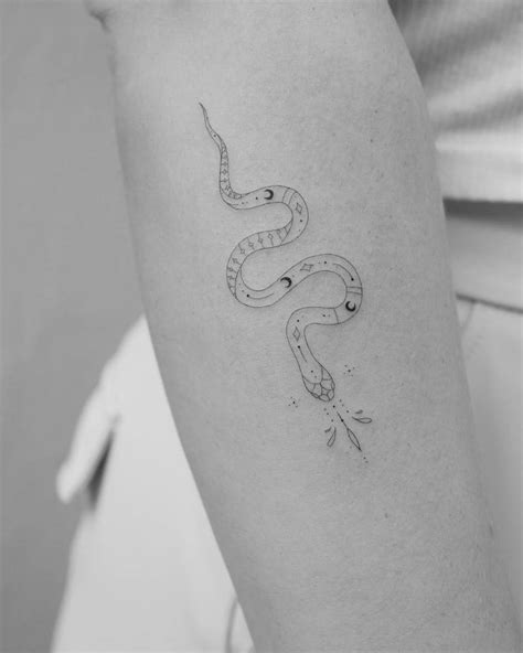 Fine Line Snake Tattoo On The Forearm