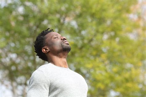 Black Serious Man Breathing Fresh Air In A Park 360 Degrees