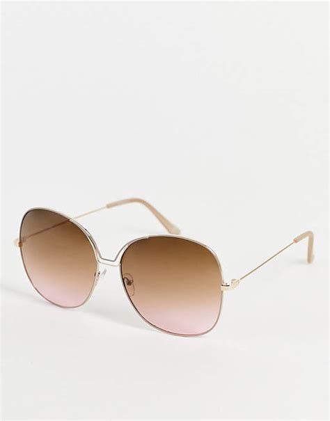 madein oversized round sunglasses with metal bridge in brown asos