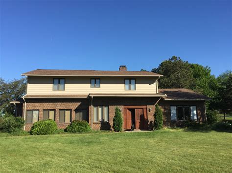 Just because you've chosen cedar as your roofing material doesn't mean the aesthetically speaking, red cedar does not age as well as white. Owens Corning Oakridge Aged Cedar