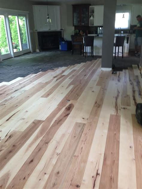 This hickory wide plank flooring features wide variations in color, from nearly white to dark brown, and a delicate balance of sound knots and natural checking. Long Length Wide Plank 5 Inch Hickory 2 to 10 Foot at ...