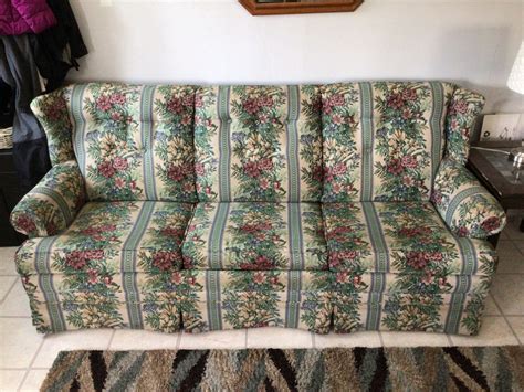 Clayton Marcus Floral Pattern Sleeper Sofa With Two Throw Pillows